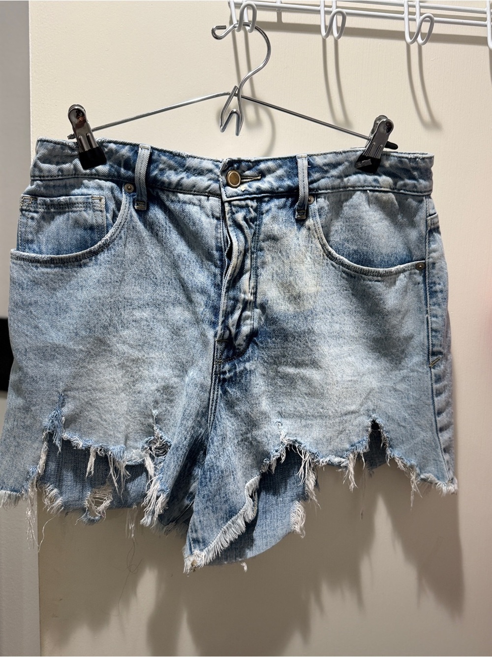 Good American Light Wash Distressed Denim Shorts